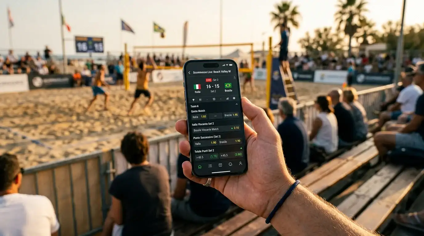 Scommesse live su smartphone durante una partita di beach volley